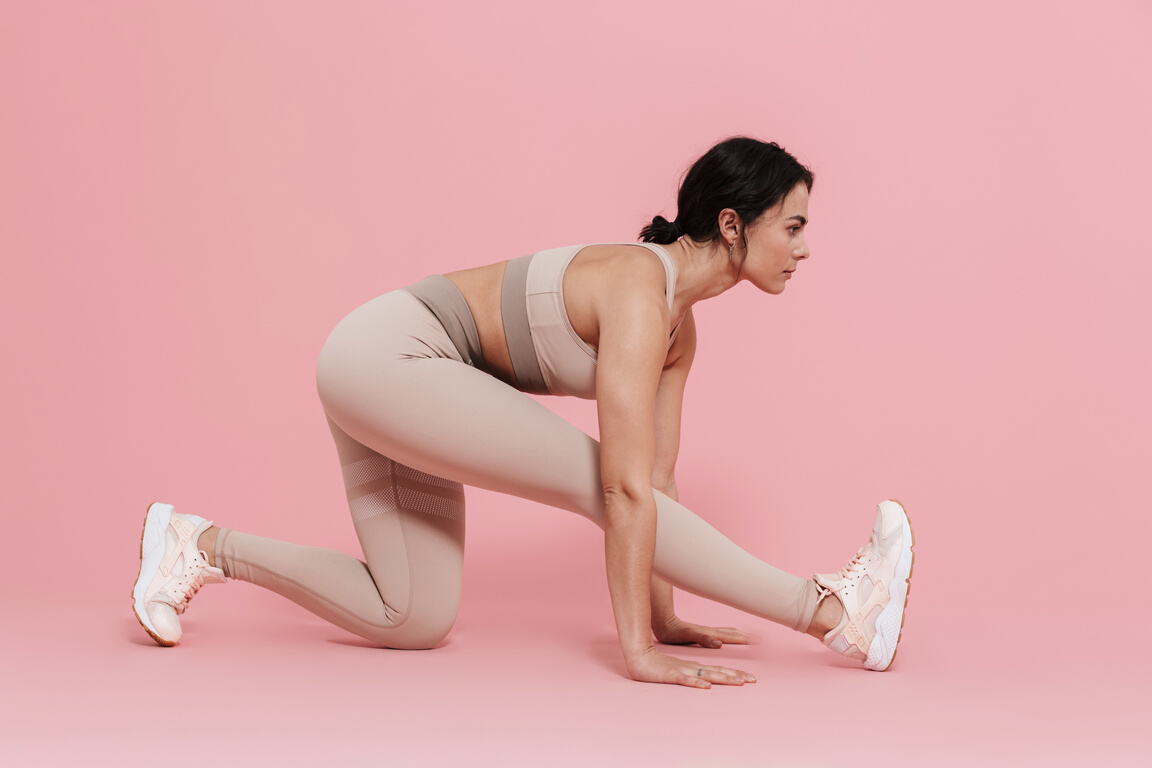 Fit Woman Doing Stretches